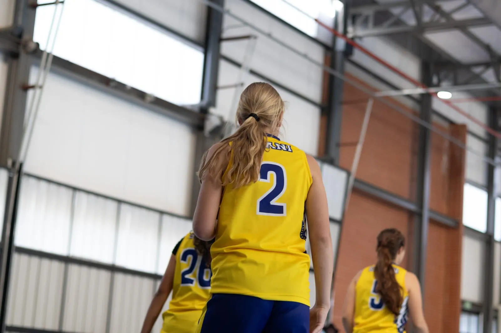 A Warriors player wearing number two walking onto court